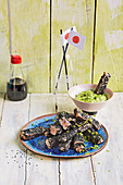 Tuna fingers with black sesame seeds served with avocado wasabi (football evening)