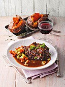 Lamb ossobuco with baked sweet potato and thyme-vanilla butter