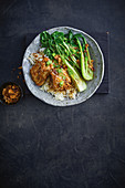 Sticky soy chicken with garlic rice and sesame sprinkle