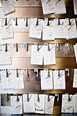 Order on scraps of paper on a board in a restaurant