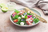 Wild herb salad with ham and mozzarella