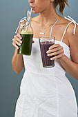 A blueberry breakfast smoothie and a Good Morning juice made with lettuce and apple