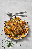 A festive whole chicken with parsley root and potatoes