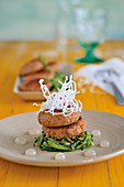 Vegan millet and fig cakes on courgette noodles with lime drops
