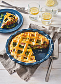 Lattice cake with vegetables and smoked meat