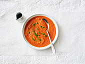 Spicy tomato soup with green oil