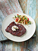 Wagyu rib-eye steak made in a Beefer with heart of palm salad