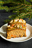 Christmas fruit cake with nuts, spices and sweet fruits