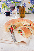 A pizza ring with Mediterranean vegetables and mozzarella