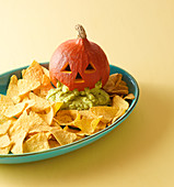 A 'puking' pumpkin with nachos