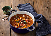 Bean soup with vegetables and sausage