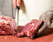 Portioning entrecôte steak