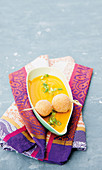 Carrot soup with spicy mozzarella balls