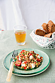 Spelt salad with mini mozzarella, courgette and tomatoes