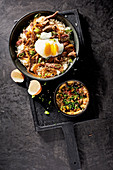 Two types of egg with beef and pork