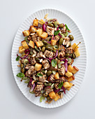 Eggplant caponata with caper apples and croutons