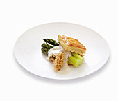 Asparagus in puff pastry with fresh morel mushrooms and vin-jaune sauce