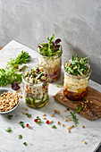 Oriental, Greek and Italian salads in jars to take away