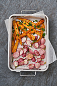 Oven-roasted sesame seed carrots and honey-glazed radishes