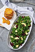 Kale salad with sweet potato fritters