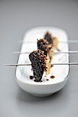 Black morels with almonds and 'liquorice sugar' made from olives