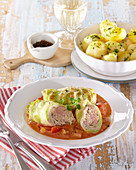 Stuffed cabbage rolls with tomato sauce