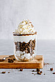 Chocolate granola with coconut and vanilla whipped cream trifle
