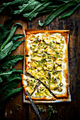 Artichoke tart with brie and herbs