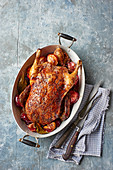 Glazed duck with spiced plums