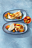 Gratinated wraps filled with rice pudding and peaches