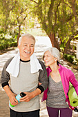 Older couple walking together outdoors