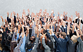 Crowd of business people cheering