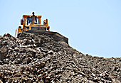 Bulldozer working in quarry
