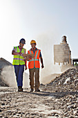 Workers talking in quarry