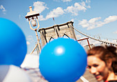 Couple with balloon walking