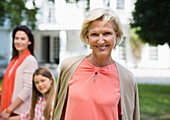 Three generations of women walking