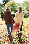 Couple holding hands outdoors
