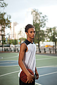 Man standing on basketball court