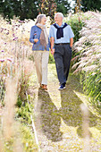 Older couple walking outdoors