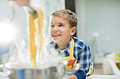 Boy smiling in kitchen