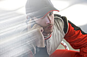 Racer talking on cell phone