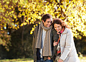 Couple walking together in park