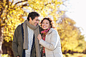 Couple walking together in park