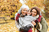 Three generations of women smiling