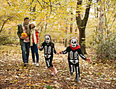 Children in skeleton costumes