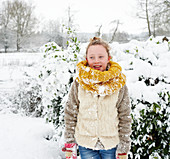 Girl smiling in snow