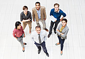 Business people smiling in hallway