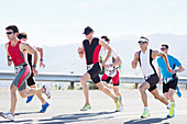 Runners in race on rural road