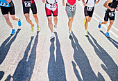 Runners in race on rural road