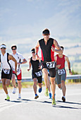 Runners in race on rural road